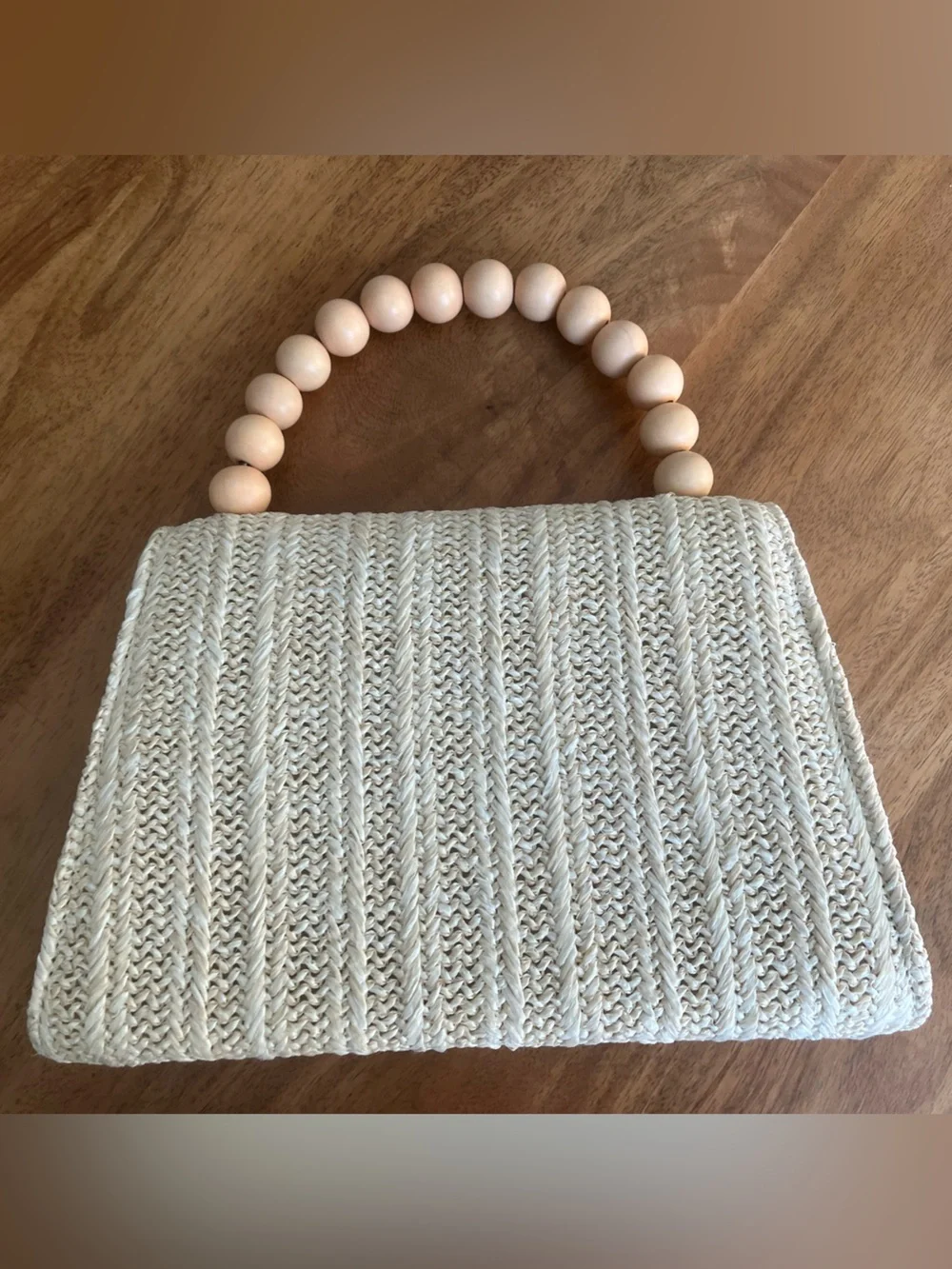 Beaded Handle Woven Straw Clutch in Natural